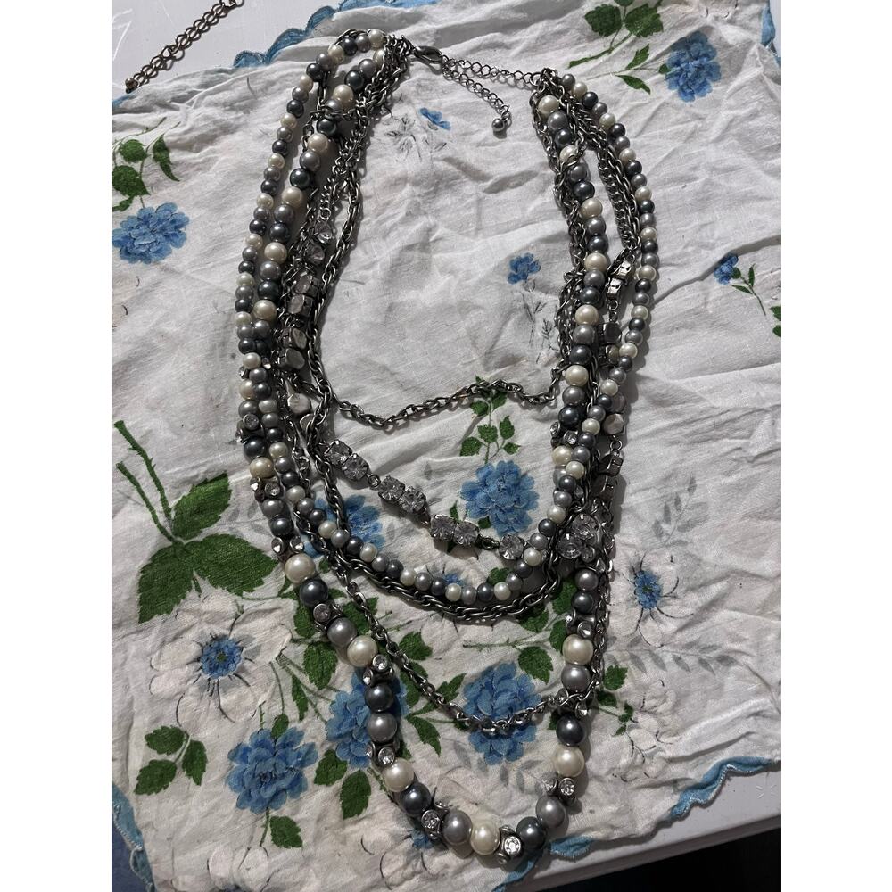 Multi strand grey and white necklace with rhinestones